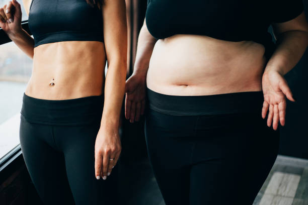 Fit and overweight woman, close up. Active lifestyle, healthy eating, weight loss, body positive concept
